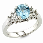 Aquamarine and white diamond gold ring.