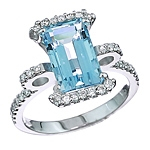 Blue aquamarine and white diamond gold ring.
