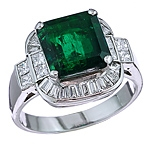 Green emerald and white diamond platinum ring
