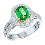 Green tsavorite and white diamond gold ring.