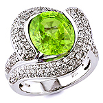 Sphene and white diamond gold ring.