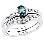 Alexandrite, white diamond and white gold ring.