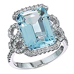 Blue aquamarine and white diamond gold ring.