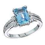 Blue aquamarine and white diamond gold ring.