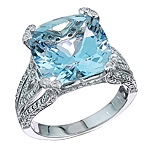 Blue aquamarine and white diamond gold ring.