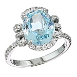 Blue aquamarine and white diamond gold ring.