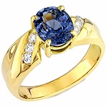 Blue spinel and white diamond gold ring.