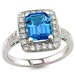 Blue topaz and white diamond gold ring.