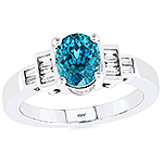 Blue zircon and white diamond gold ring.