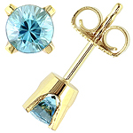 Blue zircon and yellow gold stud earrings.