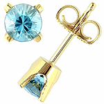 Blue zircon and yellow gold stud earrings.