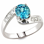 Blue zircon , white diamond and white gold ring.