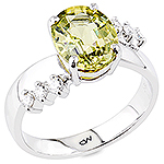 Green chrysoberyl and white diamond gold ring.