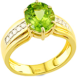 Green peridot and white diamond gold ring.