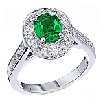 Green tsavorite and white diamond gold ring.