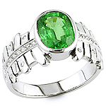 Green tsavorite and white diamond gold ring.