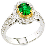 Green tsavorite and white diamond gold ring.