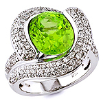 Peridot and white diamond gold ring.