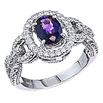 Violet sapphire and white diamond gold ring.