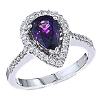 Violet sapphire and white diamond gold ring.