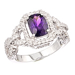 Violet sapphire and white diamond gold ring.