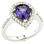 Violet sapphire ,white diamond and platinum ring.