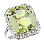 Yellow beryl and white diamond gold ring.